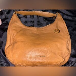 Michael Kors pebbled leather Lydia hobo bag.
